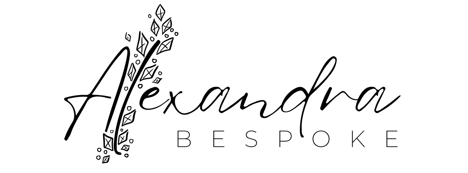 Alexandra Bespoke logo. the words "Alexandra Bespoke" with crystals and pearls branching from the letter "L"